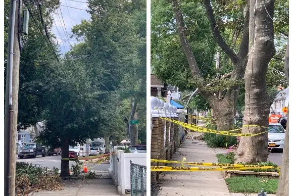Hanging power lines and a downed post in Queens on August 11th, 2020.